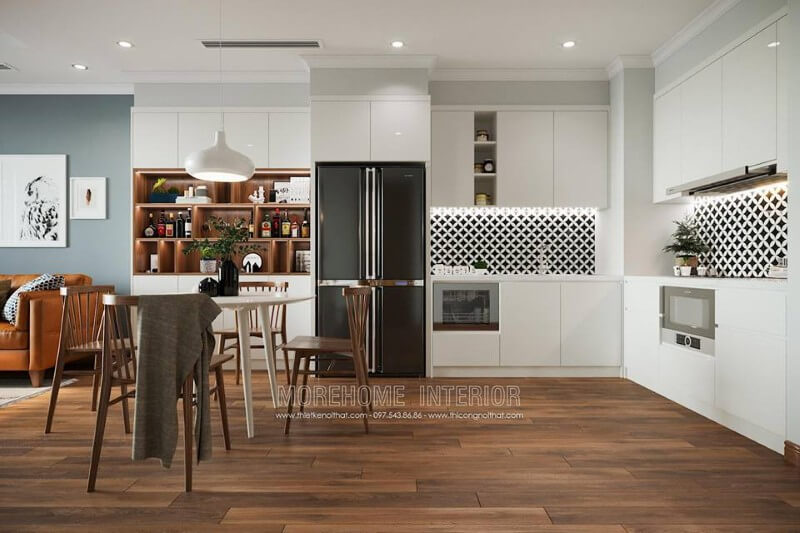 Khu vực bếp được thiết kế nhỏ gọn liên kết trực tiếp với phòng khách Thiết kế chung cư