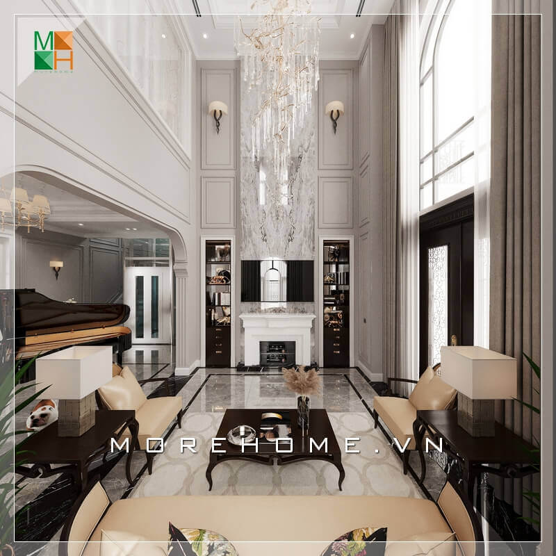 Cách bày trí không gian phòng khách rất tinh tế từ việc sử dụng đèn thả sang trọng, mọi thứ đều hài hòa và phù hợp với phong cách phòng khách tân cổ điển. Thiết kế phòng khách biệt thự